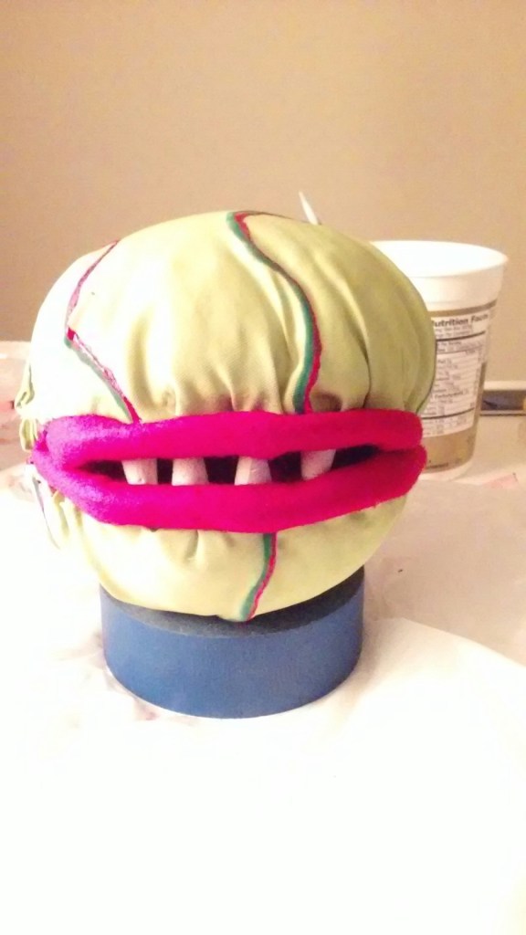 Audrey II with skin and teeth
